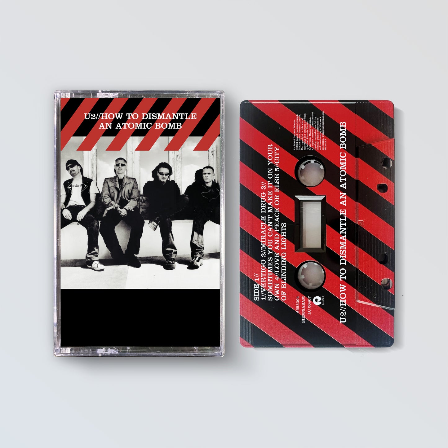 How To Dismantle An Atomic Bomb (20th Anniversary) - Cassette (Edición Limitada Exclusiva Color Rojo y Negro)